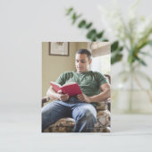 US, Utah, Young man reading Book Briefkaart (Staand voorkant)