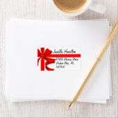 Vacances de Noël Rouge Ruban Bow Étiquettes de adr (En situation)