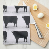 Vache noire dans la serviette de thé à la neige (Quart Plié)