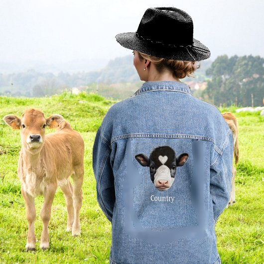 Vache noire et blanche de campagne