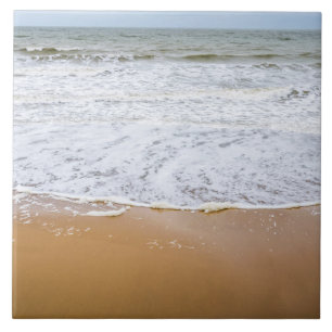 Vagues sur la plage carreaux de céramique photo