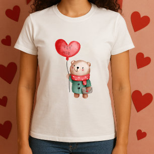 Valentijnsdag teddy - beer houdt liefdesballon aan t-shirt