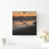 Van schemering tot schemering op het strand Foto a Vierkante Klok (Huis)