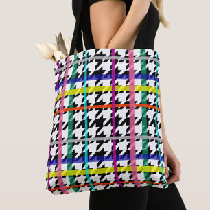 Veelkleurige lijnen op geplakt houndstooth ontwerp draagtas