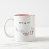 veilige omhelzing tweekleurige koffiemok (Links)