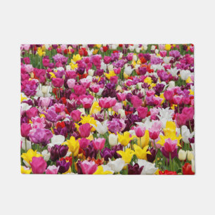 Veld vol tulpen deurmat