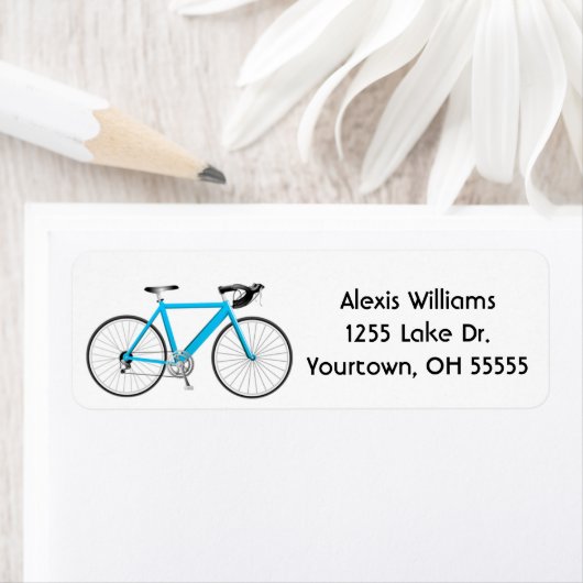 vélo turquoise sur étiquette blanc (En situation)