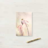 Verdin doorgesneden op penstemon post-it® notes (Op bureau)