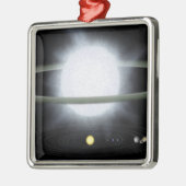 Vergelijking van de grootte van een hyperreuzenste metalen ornament (Links)