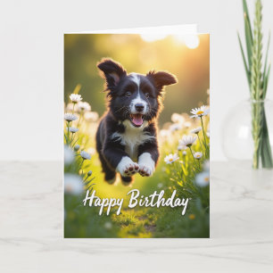 Verjaardagskaart met springende blije pup kaart