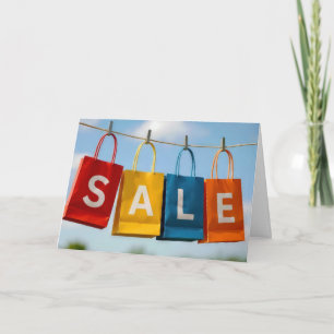 Verjaardagsshoppingtassen aan een waslijn kaart