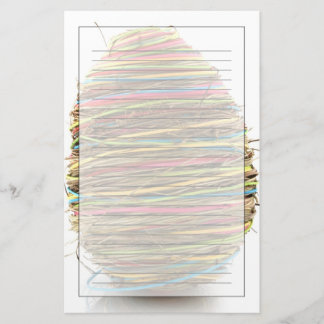 Verkleurde paaseieren boven wit briefpapier