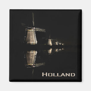 Verlichte windmolens bij nacht tekstmagneet magneet