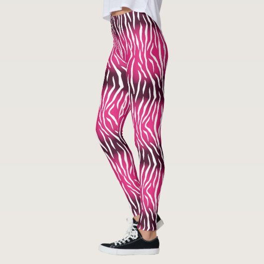 Verlooproze en witte tijgerafdrukken leggings (Links)