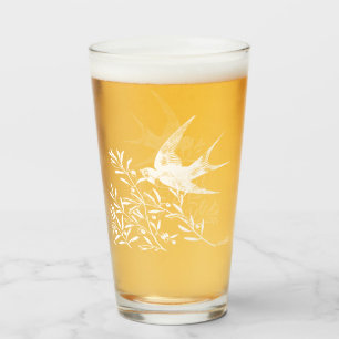 Verre Avaler l'oiseau survolant les branches d'olivier