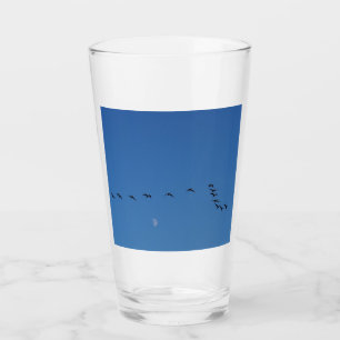 Verre oies canadiennes en vol