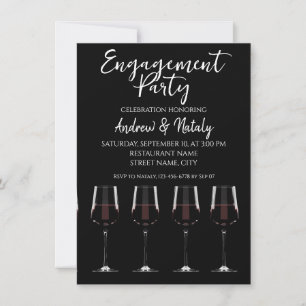 Verres à vin avec vin rouge sur invitation noire