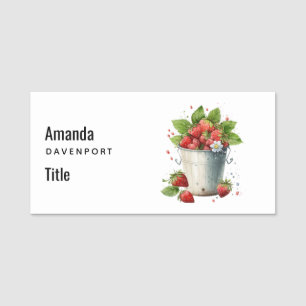 Verse geplukte aardbeien in een emmer naamplaatje