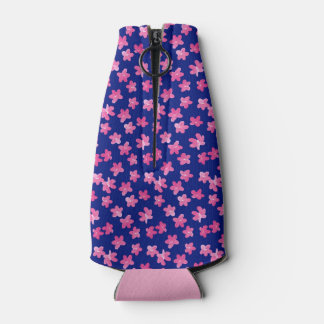 Verse & heldere bloemen in roze op blauwe achtergr flesjeskoeler