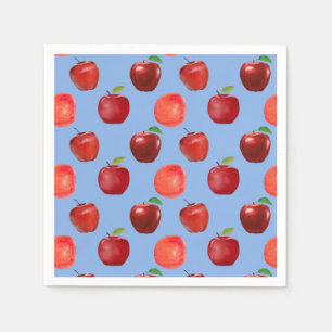 Verse rode appels op hemelsblauwe servetten