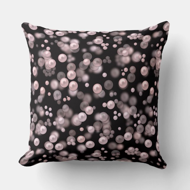 Verspreiding van roze en witte parels op zwarte ve kussen (Voorkant)