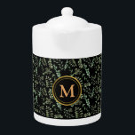 vert botanique feuille motif théière noire<br><div class="desc">La théière présente un design captivant, avec des feuilles botaniques verdoyants, étroitement imbriqués sur un arrière - plan noir élégant, créant une ambiance harmonieuse et rafraîchissante. Pour ajouter une touche de personnalisation, nous avons orné la théière d'un luxueux monogramme d'or, affichant élégamment vos initiales ou votre nom. Conçu avec soin,...</div>