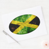 Verweerde Jamaicaanse vlag Ovale Sticker (Envelop)