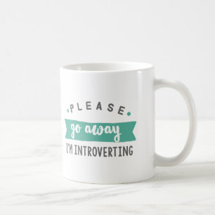 Veuillez aller loin j'introverting la tasse de