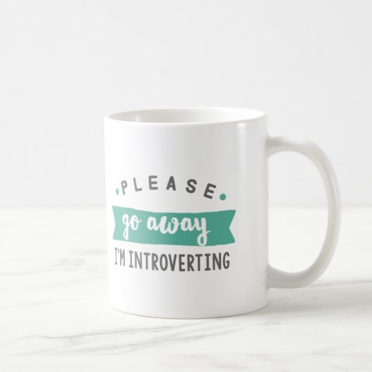 Veuillez aller loin j'introverting la tasse de (Droite)