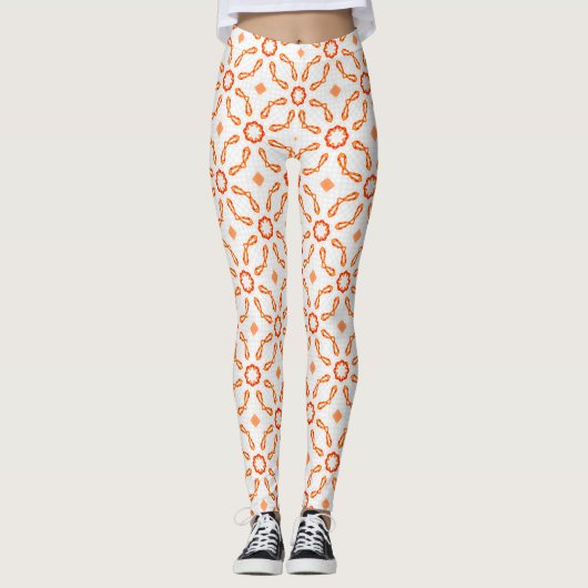 Vibrant Orange-Red Floral & Bow Pattern Leggings (Devant)