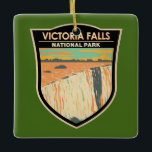 Victoria Falls National Park Travel Art Vintage<br><div class="desc">Victoria Falls dans un style vectoriel. Située à la frontière entre la Zambie et le Zimbabwe,  elle est l'une des plus grandes cascades du monde,  avec une largeur de 1 708 m.</div>