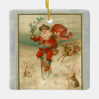 Victoriaans kerstman op fiets met hoog wiel keramisch ornament
