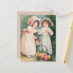 Victoriaans kinderen die een Valentijn en bloemen Feestdagenkaart