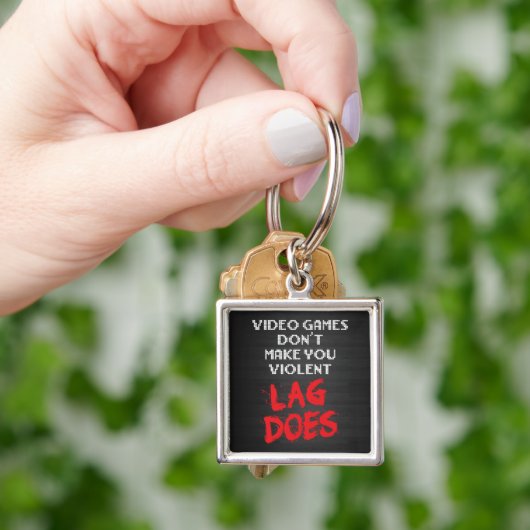 Videogames maken je niet gewelddadig. Lag doet dat Sleutelhanger (Hand)