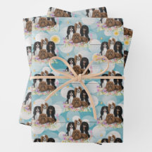 Vier Cavalier King Charles Spaniels in Flowers