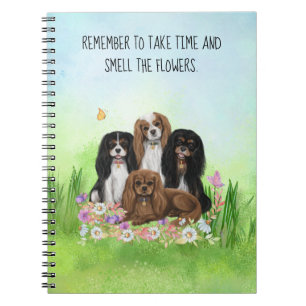 Vier Cavalier King Charles Spaniels in Flowers Notitieboek