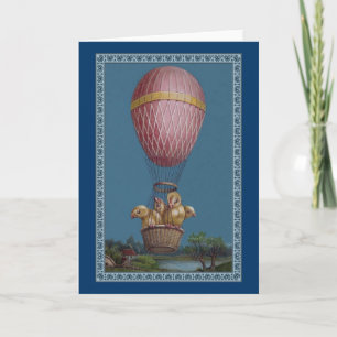 Vier paaskuikens in een luchtballon feestdagen kaart