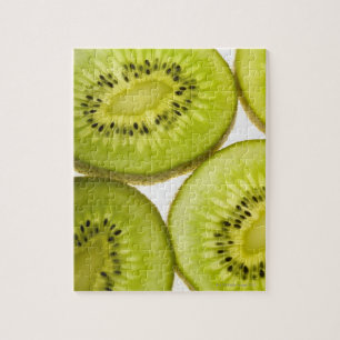 Vier stukken gesneden kiwi legpuzzel