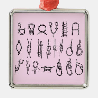 Vierkante versiering met knopen metalen ornament