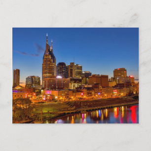 View of the city skyline at dusk briefkaart