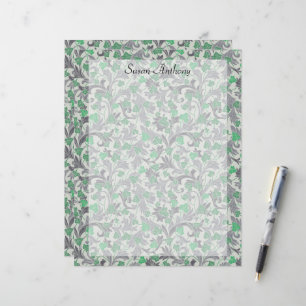 Vignes vintages de lierre vert poussant sur papier