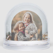 Village d'hiver rustique et neigeux Photo (Avant)