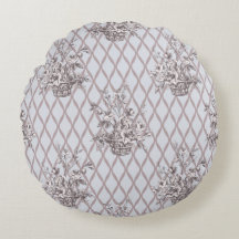 Vintage bloemenkussen in zachte blauwe tint