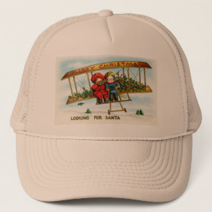 Vintage kerstkinderen die op zoek zijn naar de ker trucker pet