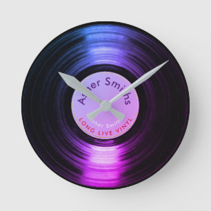 vinyl record, a purple round clock ronde klok