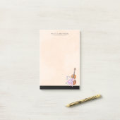 Violin, balletschoenen, bloemen en vlinders post-it® notes (Op bureau)