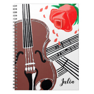 Violon avec le carnet personnalisé rose de musiqu