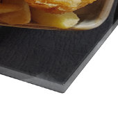 Vis en Spaanders omhoog dichtbij snijplank (Hoek)