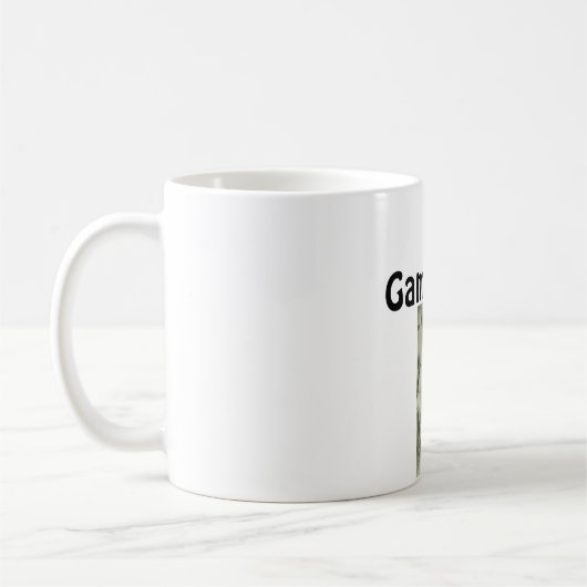 Visage de jeu sur la tasse de café de citation (Gauche)