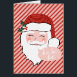 Visage Père Noël joyeux | Rose et rouge |<br><div class="desc">Cette carte présente un visage Père Noël joyeux sur un arrière - plan rayé rose et rouge avec un texte qui dit "ho,  ho,  ho" en lettres blanches dans une bulle de conversation rose. L'intérieur a un accueil de vacances et un endroit pour que vous personnalisiez avec vos noms.</div>